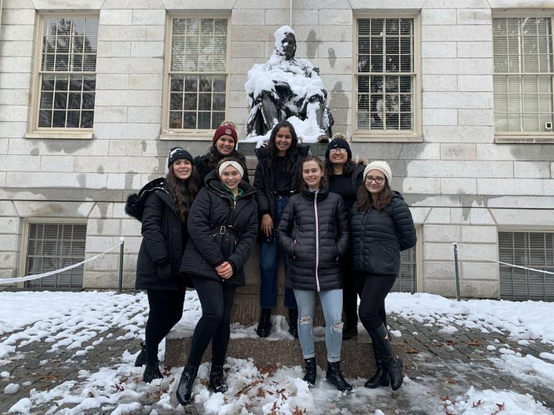 My friends and I in front of the John Harvard Statue after playing in the snow 