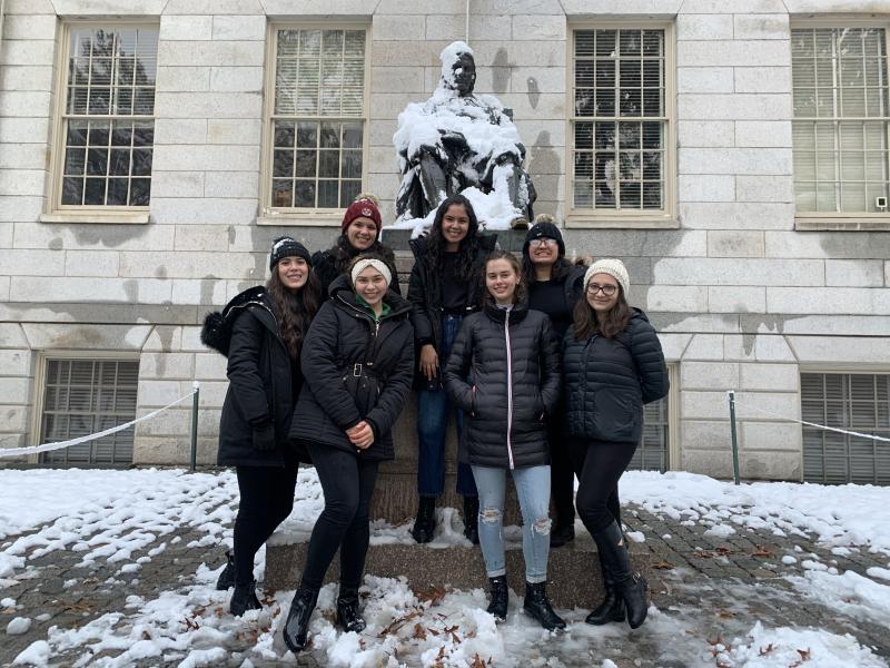 My friends and I in front of the John Harvard Statue after playing in the snow 