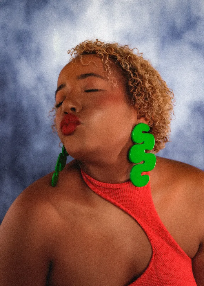 Portrait of female student puckering lips