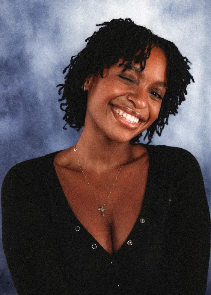 Portrait of female student winking
