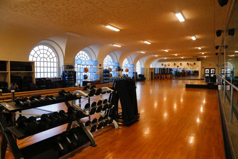 A view of a dance studio with workout equipment