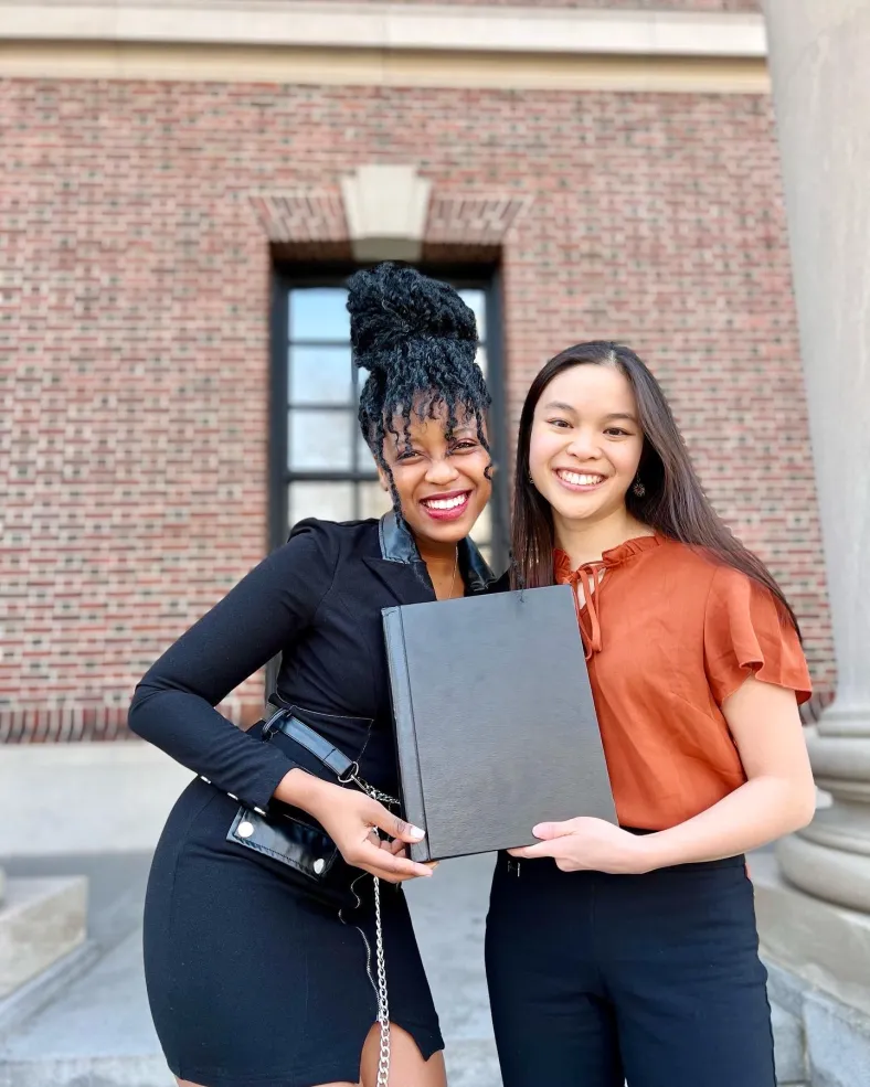 Picture of me and my roommate after she completed her thesis