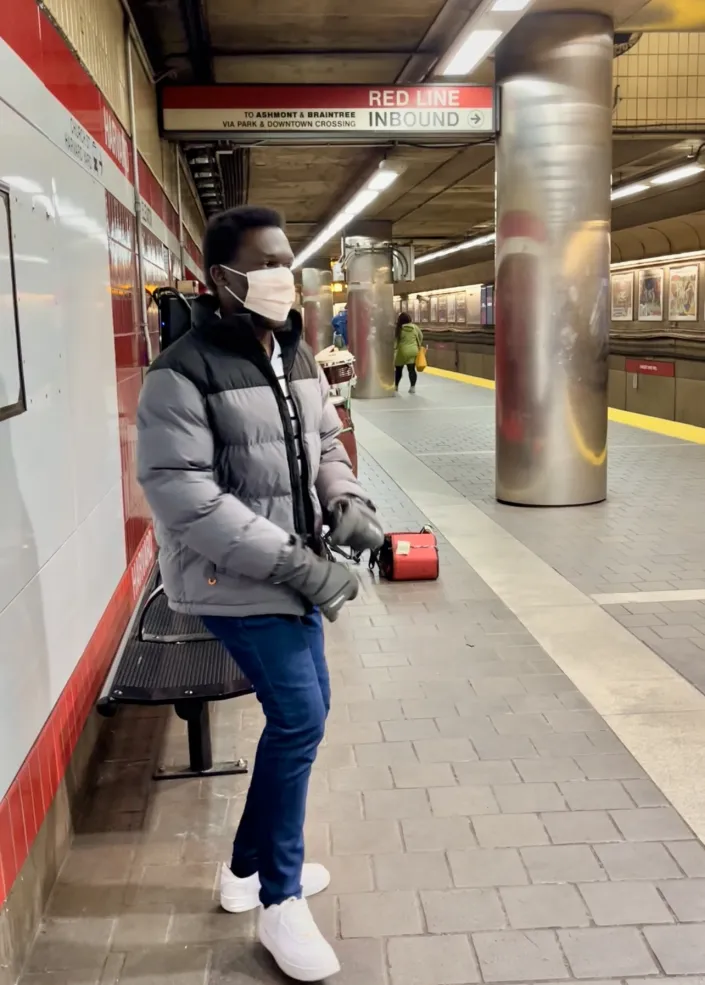 myself waiting in the Harvard Square subway station for the next train