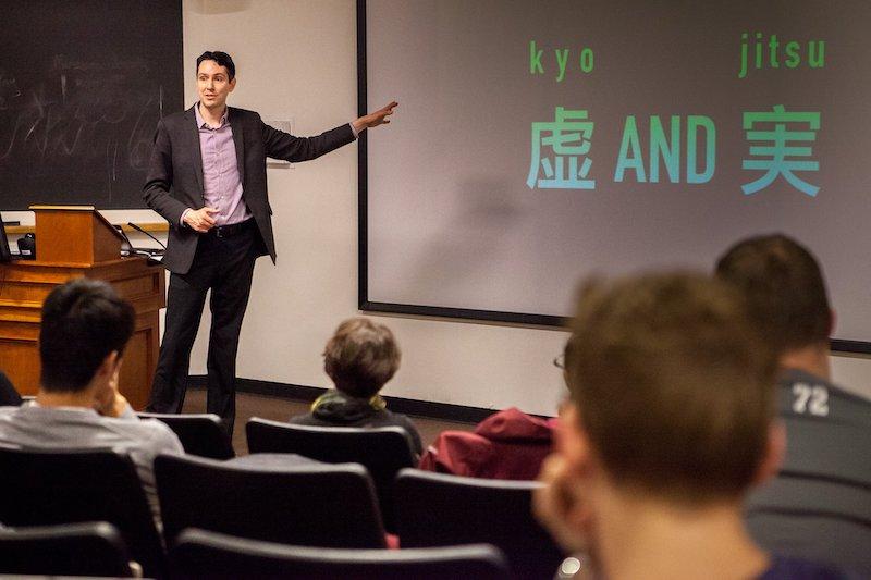 An image of David Atherton teaching his students about revenge tales in early modern Japan.