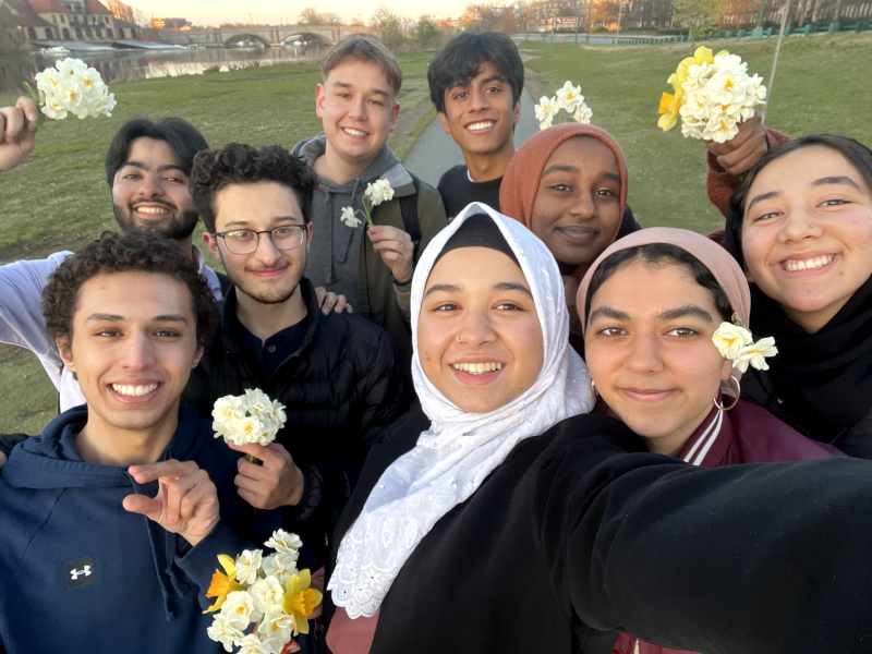 Samia and her friends taking a walk by the Charles River to watch the sunrise after suhoor.