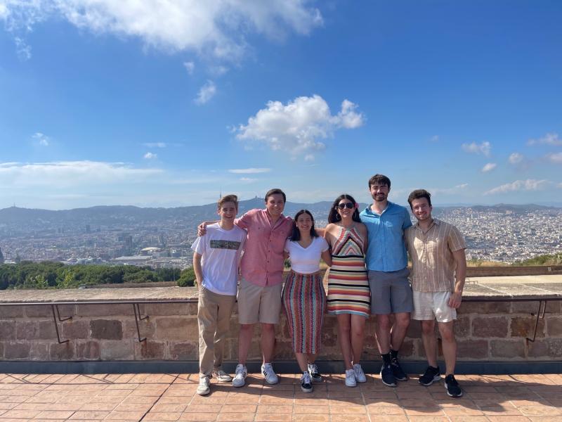 Author and five friends posing for a photo in Barcelona