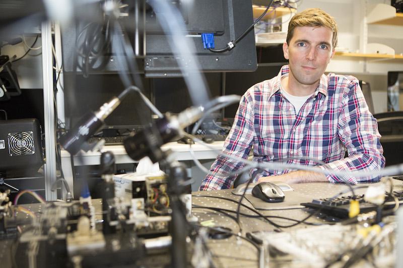 Robert Wood in a robotics lab. Photo credits to Eliza Grinnell, SEAS.