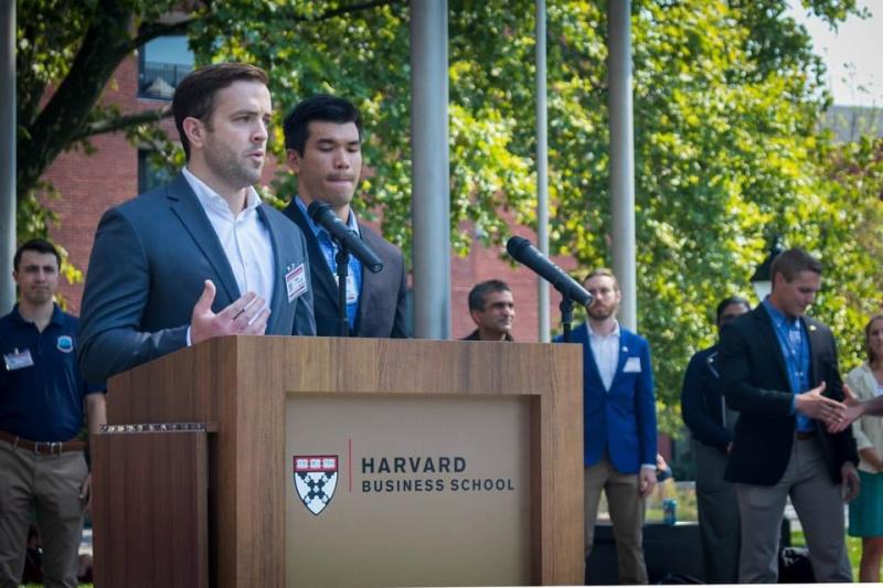 Hudson Miller giving a brief overview of the Harvard Undergraduate Veterans Organization at the 2022 Harvard University Welcome Back Barbecue