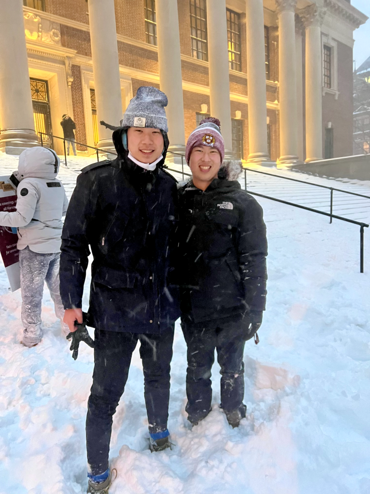 Michael and his friend Henry posing in the snow