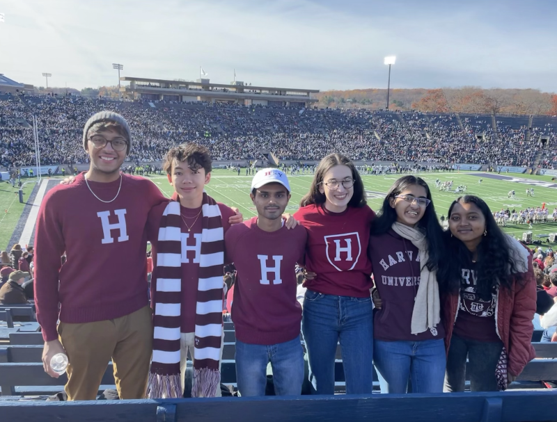 Cameron and five friends at a football stadium