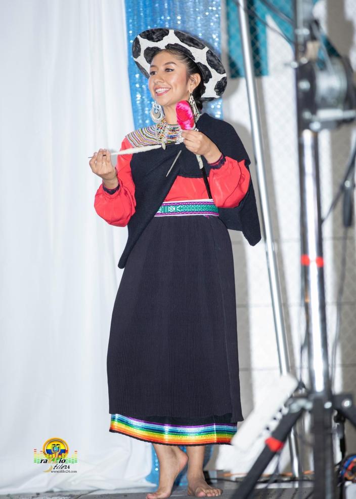 Writer posing with her huango during the competition