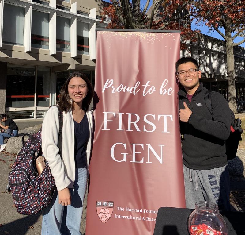 Picture of Ana and Raymond beside a red &quot;Proud to be FIRST GEN&quot; banner.
