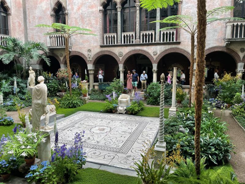 Open garden area with statues in the Isabella Steward Gardner Museum