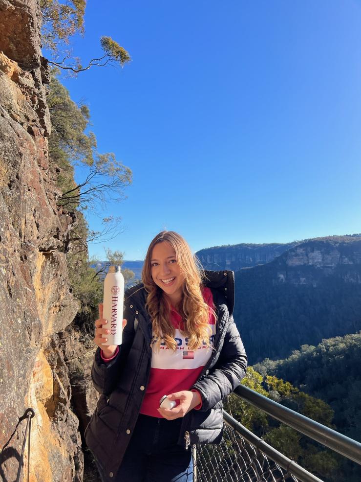 A photo of a girl posing with a water bottle