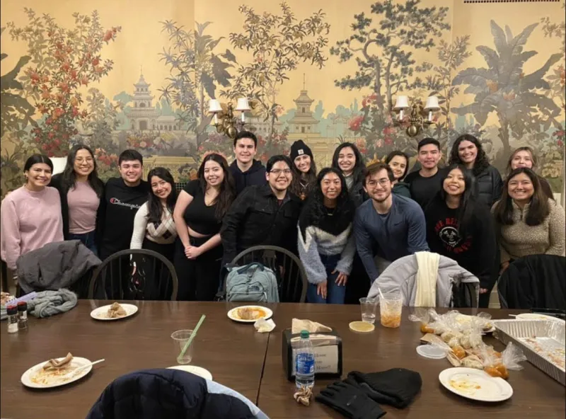 A large group of students smiling for a photograph