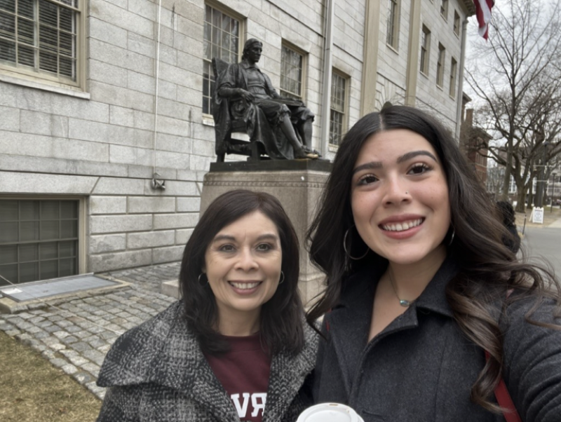 Selfie of mother and daughter by the Jon Harvard statue