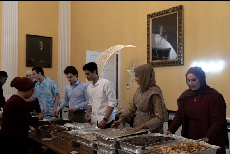 Students Serving Food at the Eid Banquet