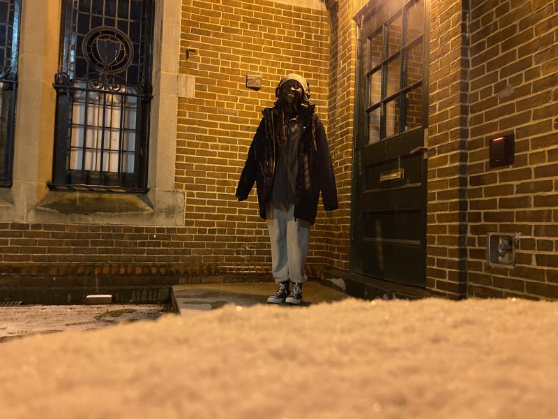 Student standing in snow