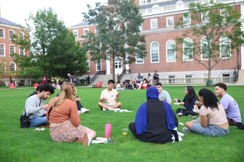FYRE families having dinner together in Radcliffe Yard