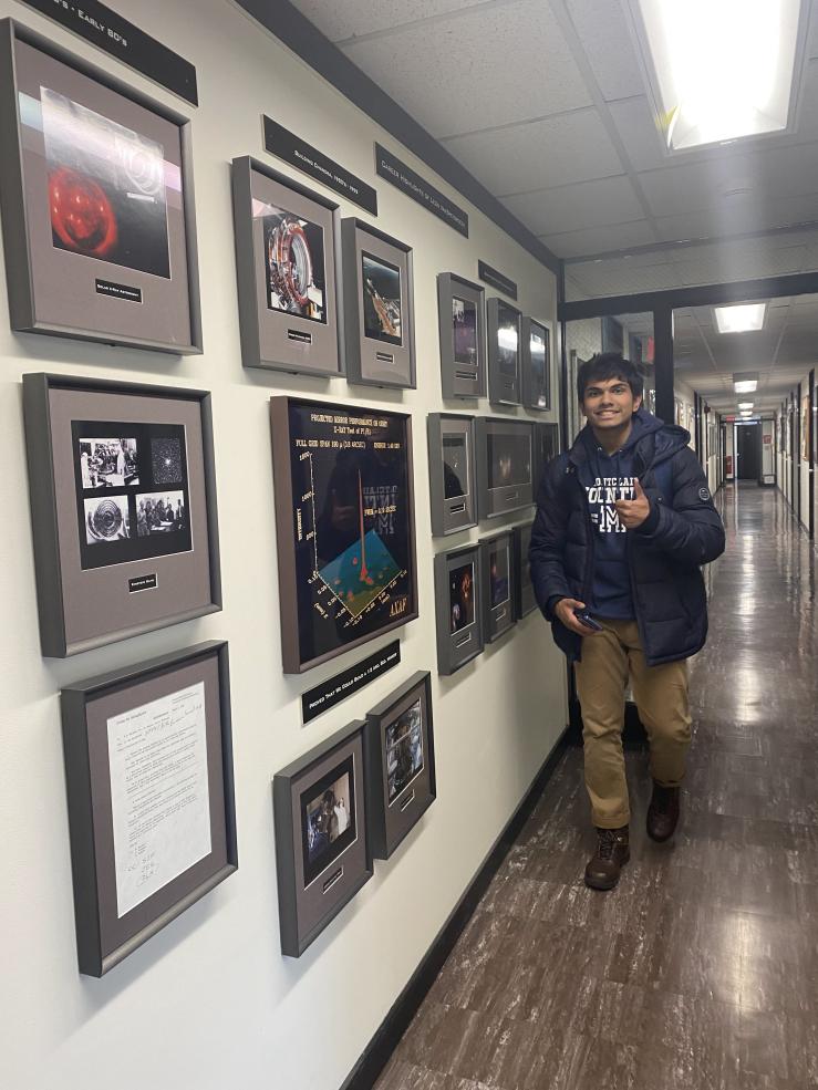 Rafid walking down a hallway in the Center for Astrophysics | Harvard &amp; Smithsonian