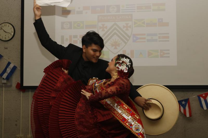 Graduate Students performing a traditional Peruvian dance