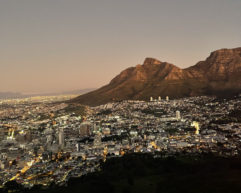 Night time view of the city and mountains