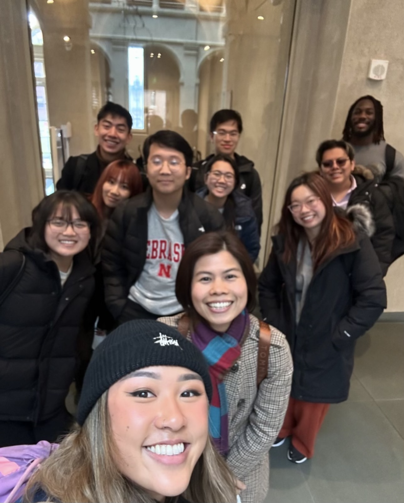 A selfie with a group of people inside the Harvard Art Museums.