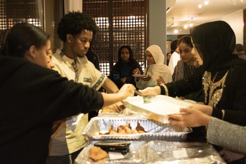 EESA and BASHA members serving iftar to students