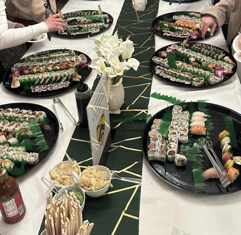 This is a pictur of various platter of sushi, for an Open House hosted by the Lev Faculty deans. 