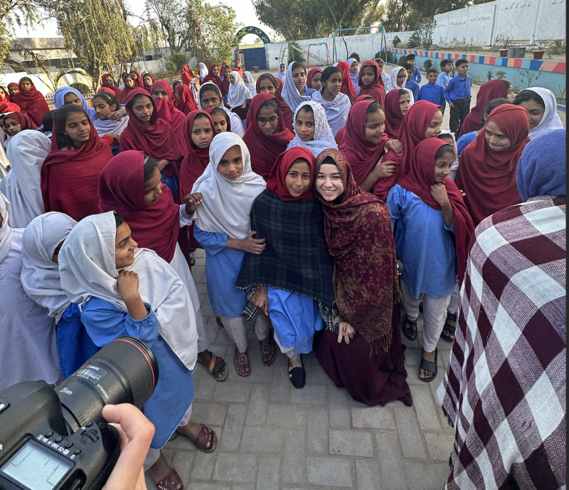 Samia Afrose with students at an all girl's school