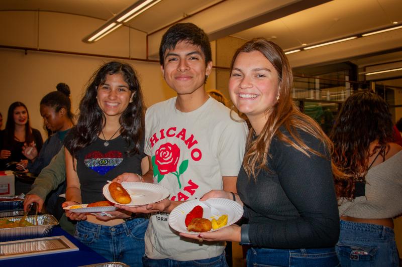 Attendees Posing with Food