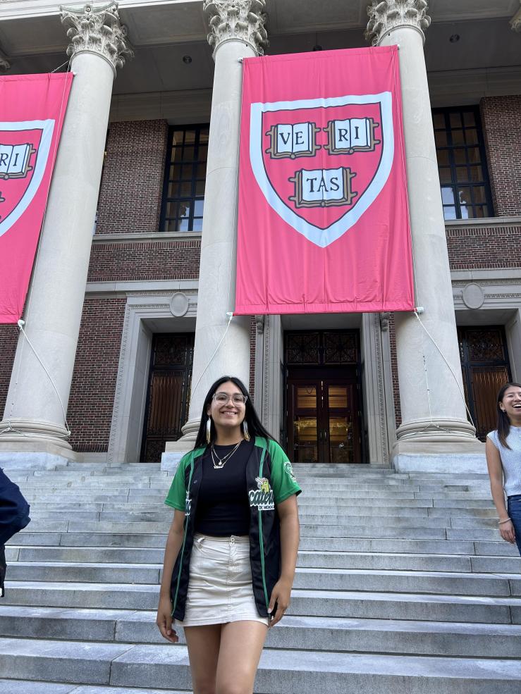 Lizbeth pictured on Widener Library steps on the first day of junior year. 