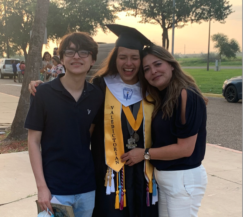 Ana with the two people who most supported and motivated her during high school, her mom and brother, after her high school graduation.