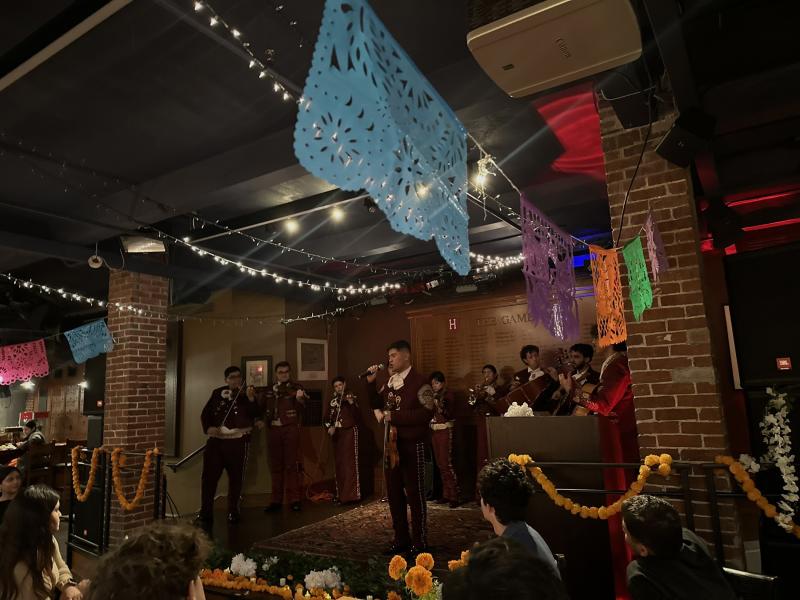 A picture of Mariachi Veritas performing at RAZA"s Dia de los Muertos Soireé. 