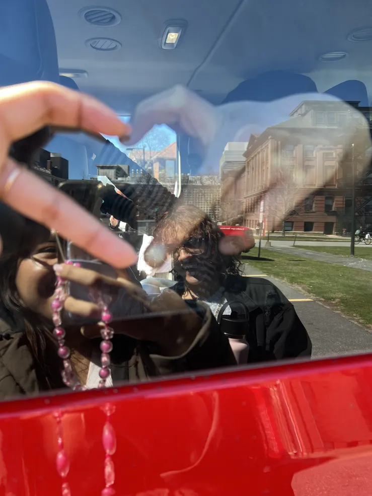 Making a hand heart with one of my youth!