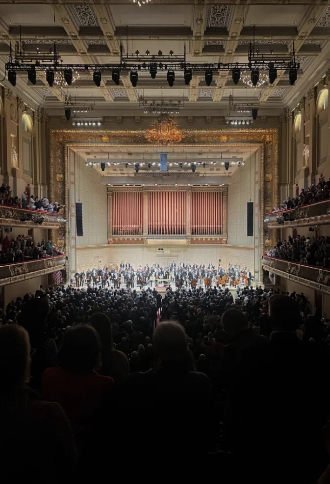 Audience clapping for the Boston Symphony Orchestra after their performance. 