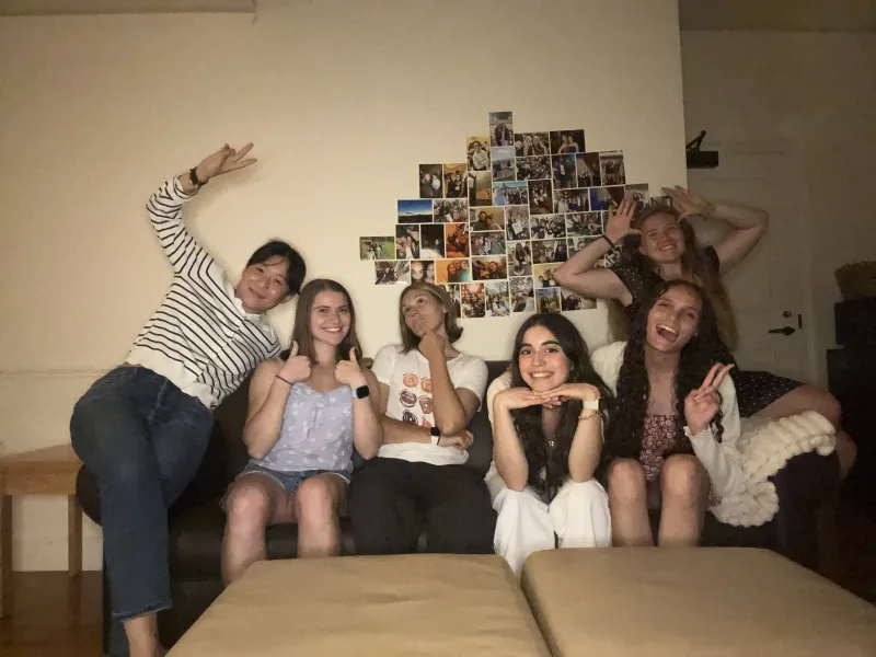 My roommates and I sitting on our couch after the first day of classes