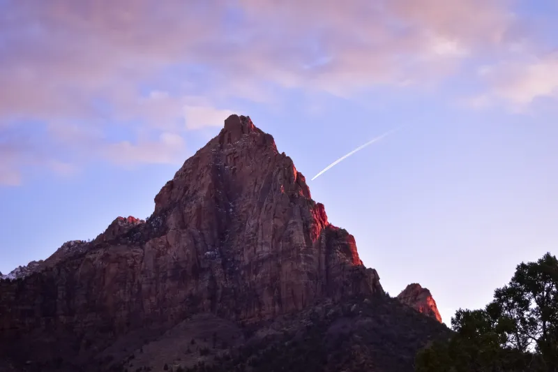 A picture of a red mountain peak along the Watchman Trail.