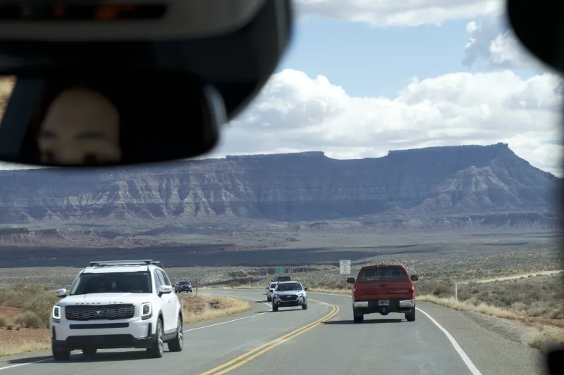 A picture of the mountains near Zion National Park taken from inside the car.