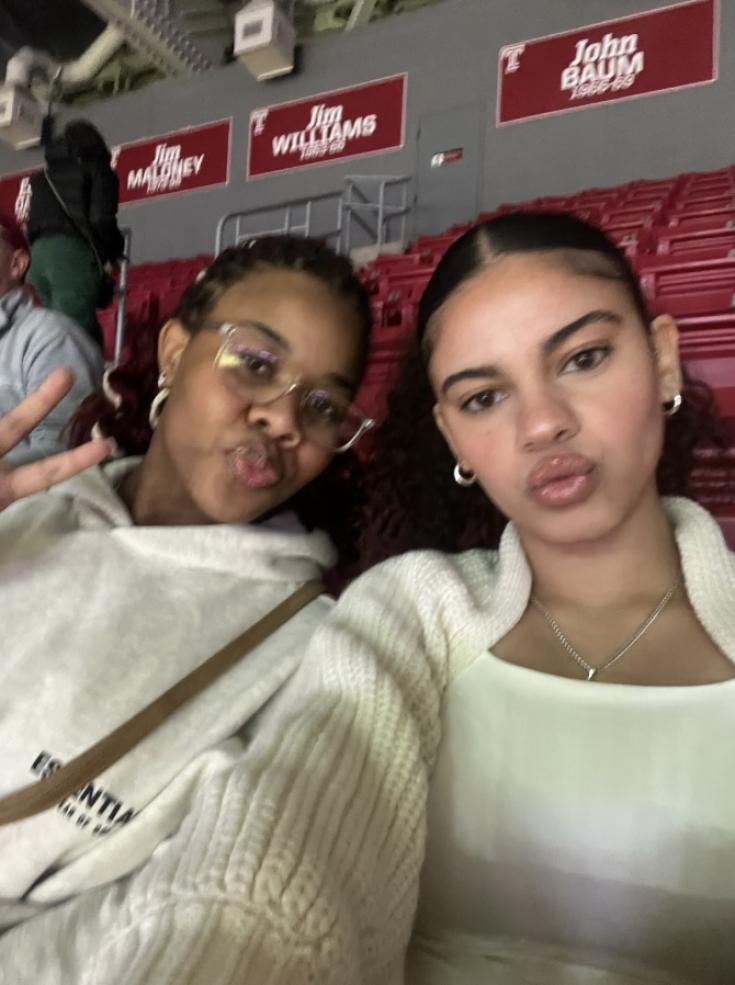 Two girls posing for a selfie.