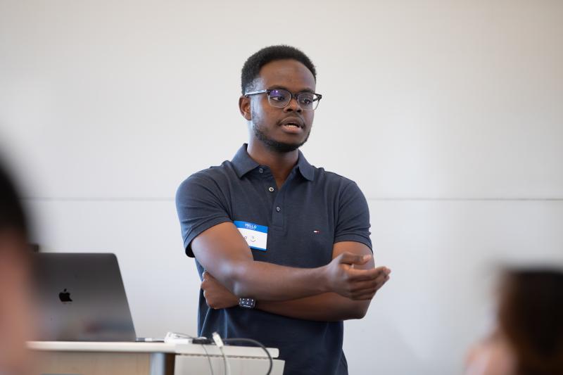 Inno speaking during the spring 2024 CS50 staff training session.