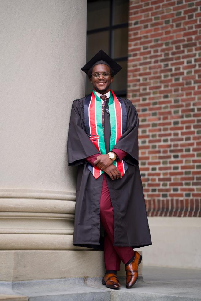 David in graduation regalia & a Kenyan stole