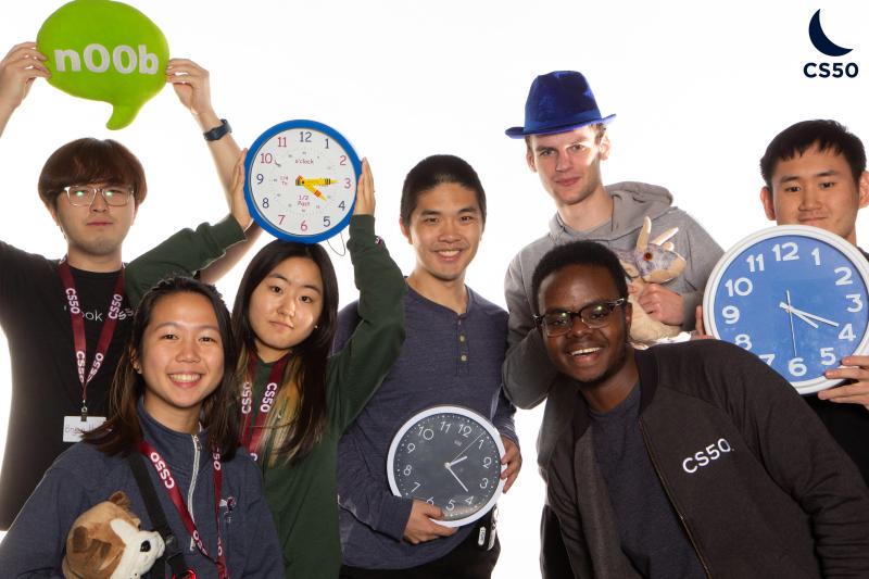 Photobooth photo of Inno and a few other staff members at the CS50 Hackathon in Fall 2022