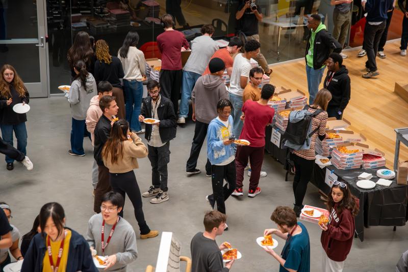 Pizza being served at the Fall 2024 CS50 Hackathon.