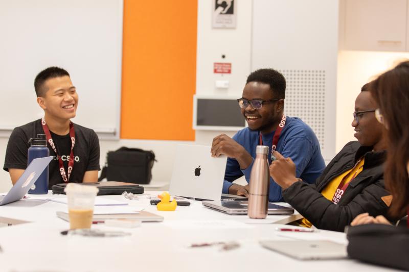 Inno (and staff cohort) after cracking a joke during the CS50 staff training held in fall 2023.