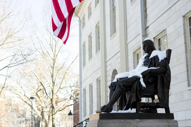 John Harvard Covered in Snow