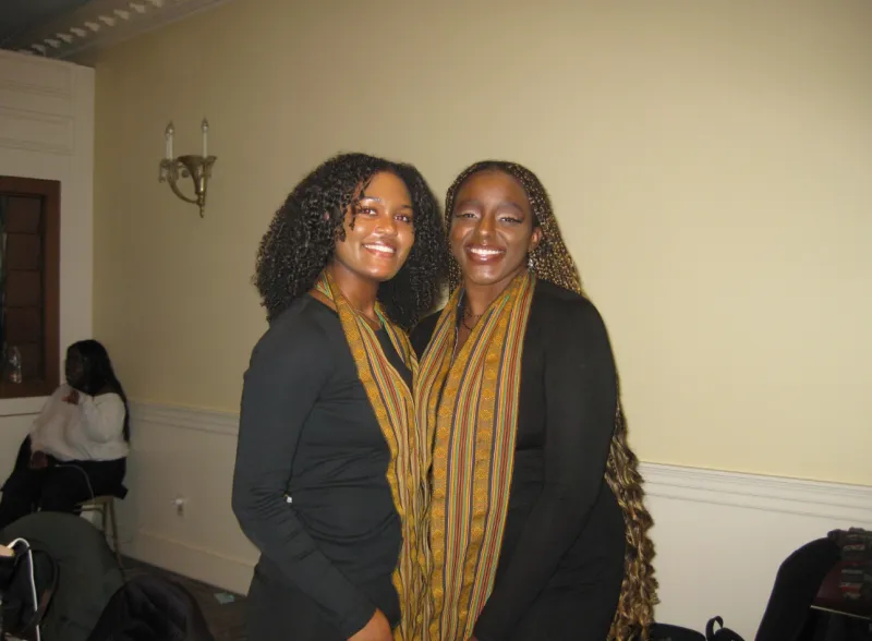 2 singers from Kumba standing next to each other
