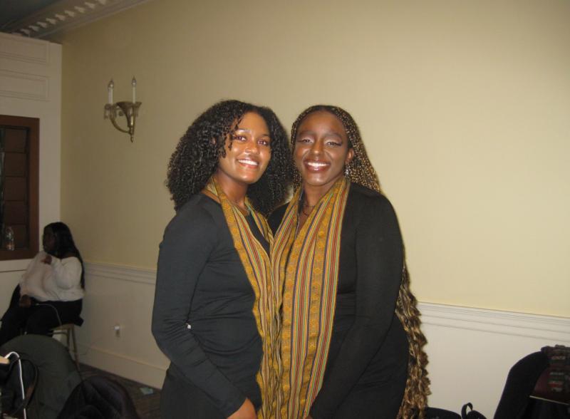2 singers from Kumba standing next to each other