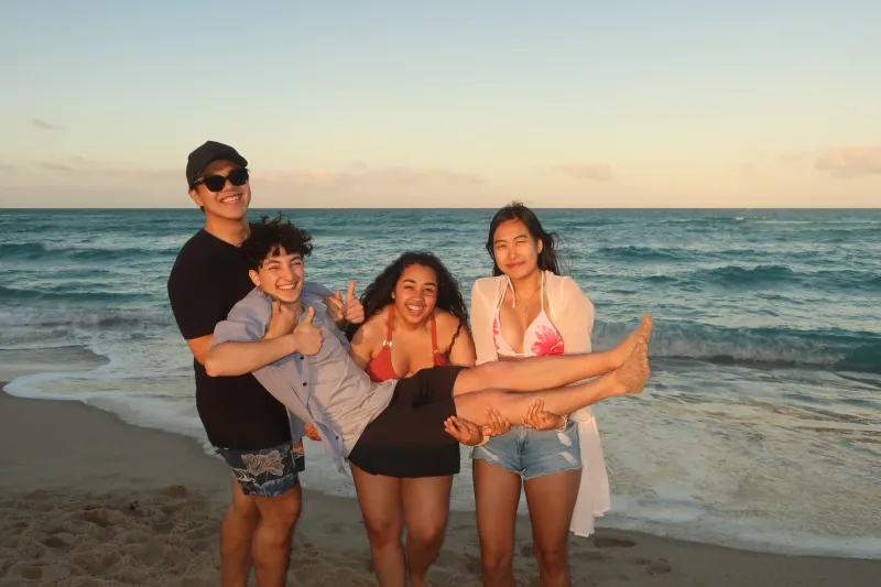 Aileen and her friends at the beach