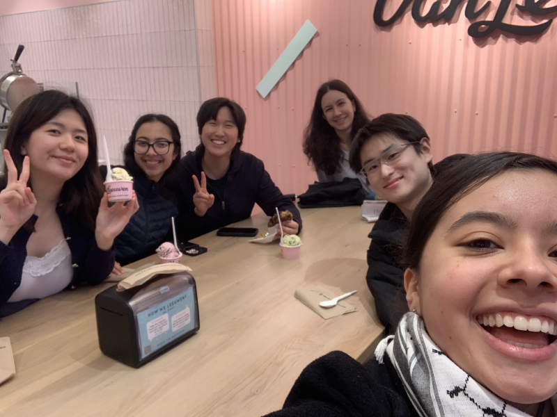 At an ice cream shop with my Sib Fam during the spring semester of my freshman year, smiling and enjoying a casual outing together.
